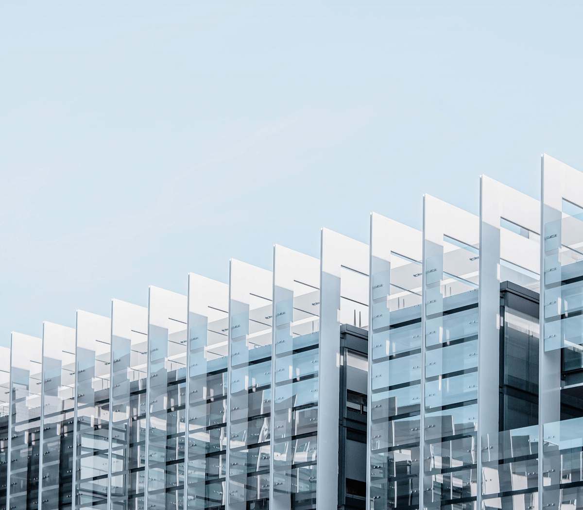 office building gray glass building condo